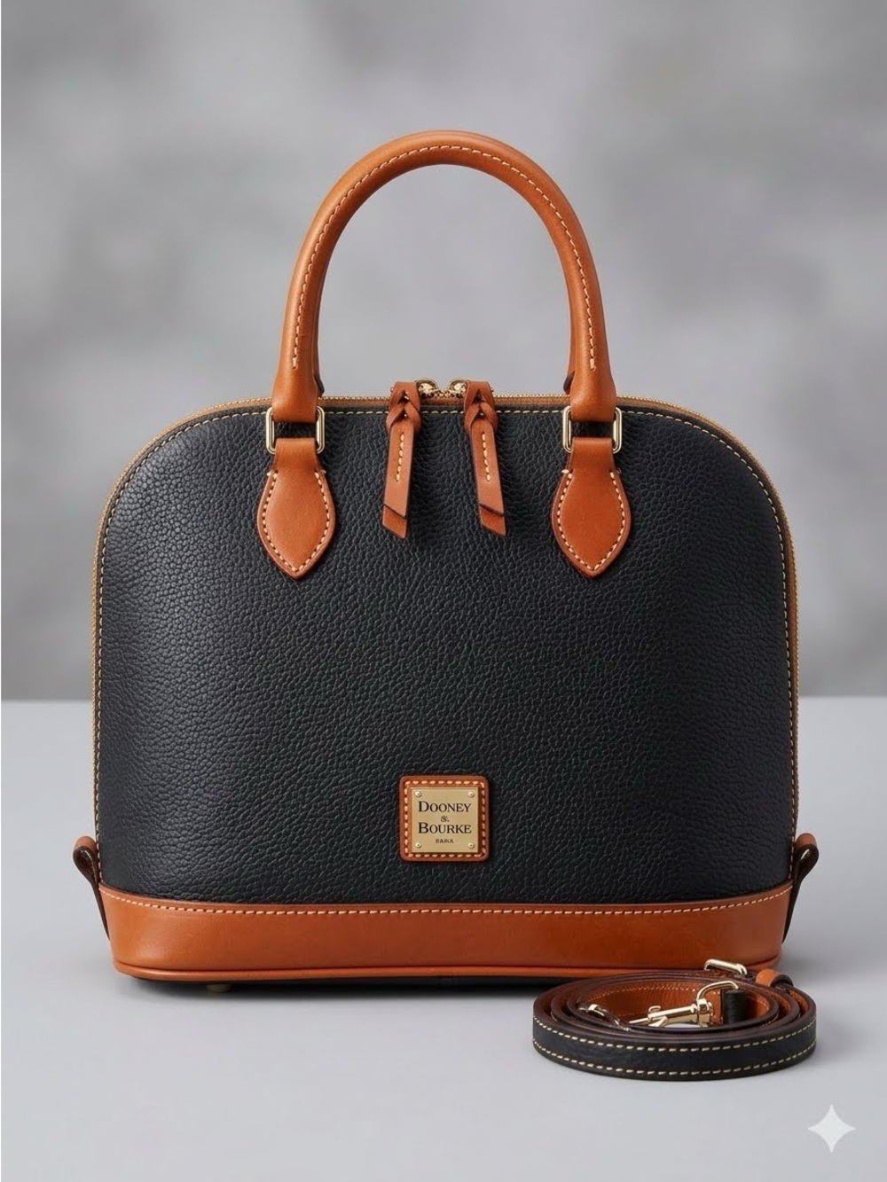 Dooney & Bourke Black and Tan Pebble Leather Dome Satchel